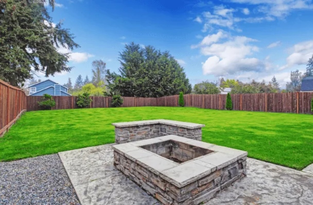 Custom outdoor fire pit and patio installation